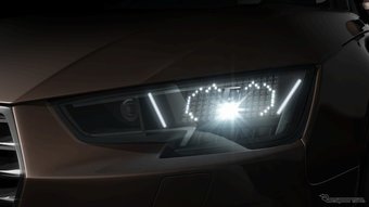 Audi выпустила информационные светодиодные фары с эмодзи для японского рынка